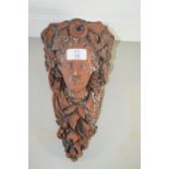 TERRACOTTA WALL BRACKET MODELLED AS THE HEAD OF A CLASSICAL LADY