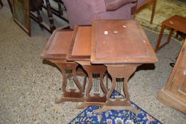 REPRODUCTION NEST OF THREE LEATHER TOPPED TABLES, APPROX 53 X 38CM LARGEST