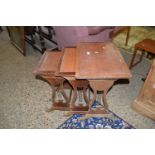 REPRODUCTION NEST OF THREE LEATHER TOPPED TABLES, APPROX 53 X 38CM LARGEST