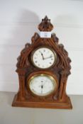 CASED CLOCK AND BAROMETER IN CARVED FRAME