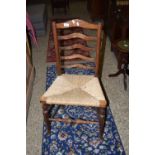 EARLY 20TH CENTURY RUSH SEAT LADDERBACK CHAIR, HEIGHT APPROX 94CM