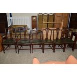 SET OF SIX MAHOGANY SERPENTINE DINING CHAIRS WITH CARVED DETAIL TO SPLAT (4+2)