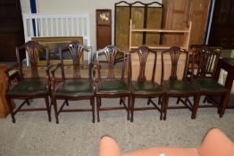 SET OF SIX MAHOGANY SERPENTINE DINING CHAIRS WITH CARVED DETAIL TO SPLAT (4+2)