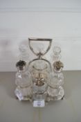 PLATED SET OF GLASS VINEGAR BOTTLES ETC WITH PLATED MOUNTS