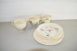 PART DOULTON TEA SET IN THE COPPICE PATTERN, COMPRISING THREE CUPS, SAUCERS AND SIDE PLATES