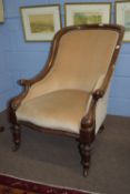 Pair of 19th century mahogany framed upholstered armchairs, raised on ring turned legs, width approx