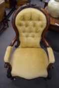 Victorian mahogany framed button back elbow chair, width approx 67cm max