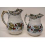 Two Holly jugs made by Davenport, late 19th century, with Holly printed designs (2)