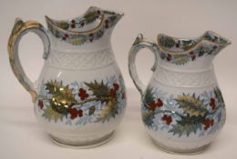 Two Holly jugs made by Davenport, late 19th century, with Holly printed designs (2)