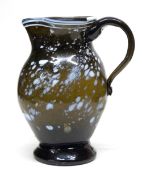 Small Nailsea glass jug, the olive green ground with a trailing white design, possibly late 18th