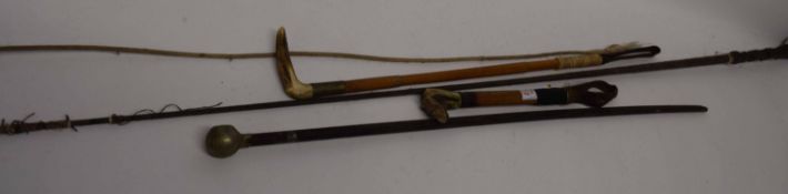 Small riding crop with dog handle, together with a whip with bone handle and swagger stick with