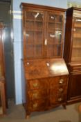 Late Georgian mahogany bureau bookcase, the top section with concave sided cornice above two glass