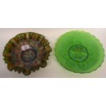 Two pieces of carnival glass bowls, with floral designs, one green ground, the other with a grape