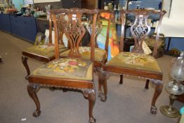 Set of 5 Chippendale style mahogany dining chairs, elaborate pierced splat backs, old tapestry