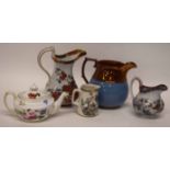 Late 19th century and later ceramics comprising lustre jug, ironstone jug, two small jugs and