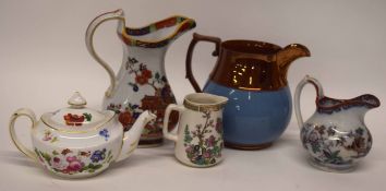 Late 19th century and later ceramics comprising lustre jug, ironstone jug, two small jugs and
