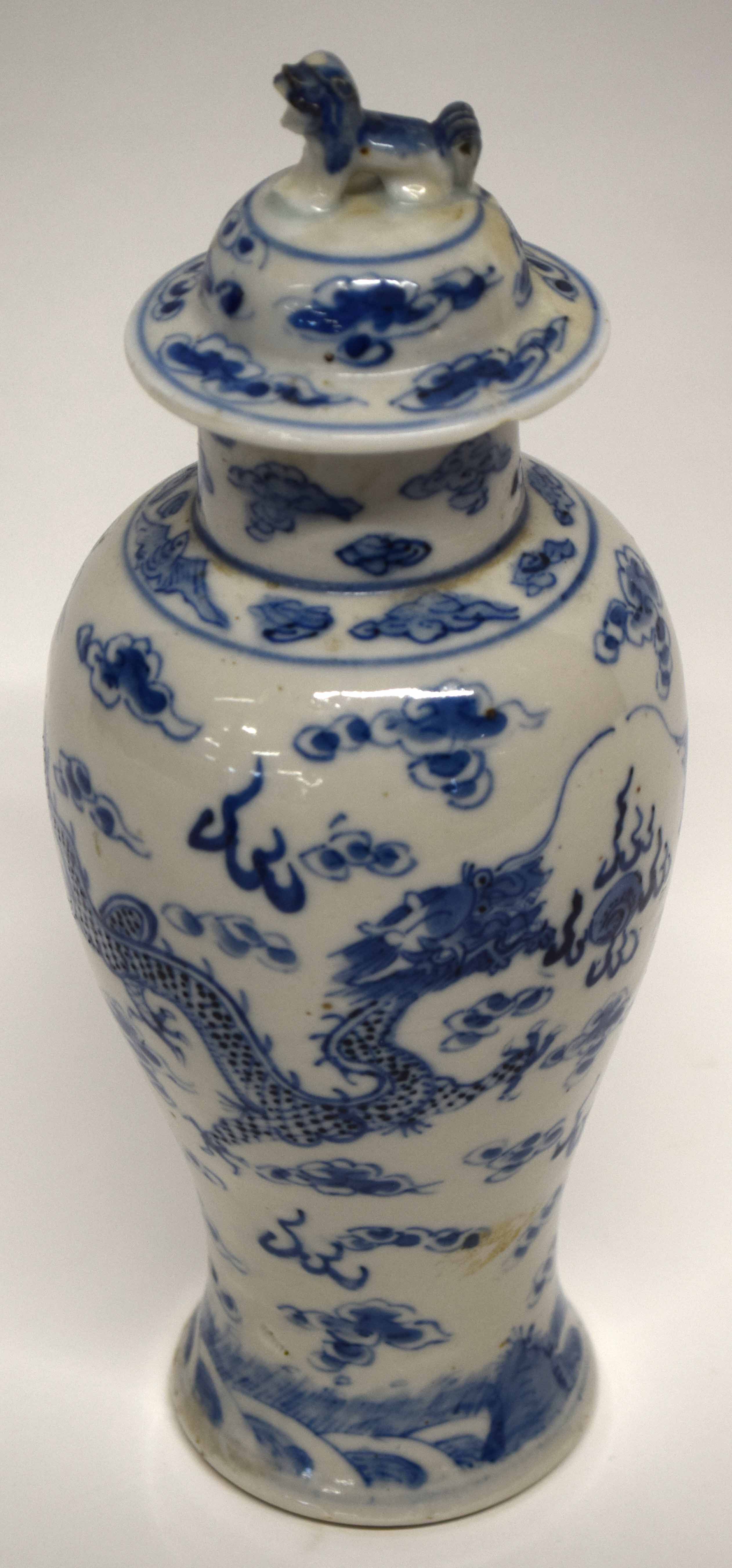 Chinese porcelain vase and cover decorated with a four-clawed dragon chasing the flaming pearl, with