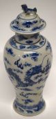 Chinese porcelain vase and cover decorated with a four-clawed dragon chasing the flaming pearl, with