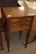 Small Edwardian mahogany sewing chest raised on tapered legs enclosing two drawers, with folding