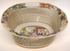 Late 18th century Chinese porcelain chestnut basket, the interior decorated in polychrome with