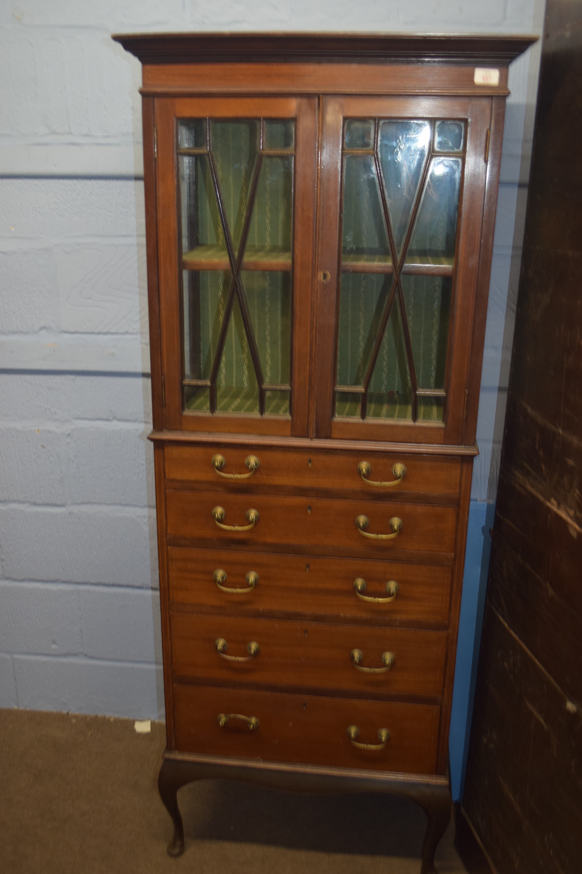 Edwardian chest of five drawers with astragal glazed display cabinet above, raised on cabriole feet,