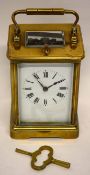 Good quality brass and glass cased Carriage Clock