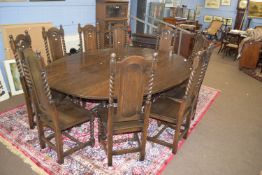 Large and impressive oval gateleg table, raised on barley twist supports, together with a set of ten