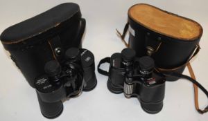 Two binoculars in cases, one manufactured by Chinon 10x50, the other by Prinzlux Spacemaster 7x50 (