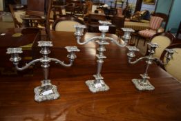 Set of three graduated silver plated candelabra, the largest height approx 34cm