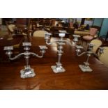 Set of three graduated silver plated candelabra, the largest height approx 34cm