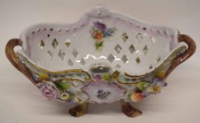 Continental porcelain flower basket with floral encrusted decoration and blue crossed marks to base,