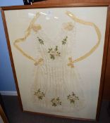 Framed 19th century maid's apron, the silk embroidered with flowers, in wooden frame