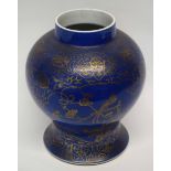 19th century Chinese porcelain jar, the blue ground decorated in gilt with birds on branches amongst