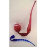 Two Nailsea type glass pipes