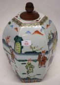 Faceted Chinese porcelain vase decorated in famille vert palette with Chinese figures, 35cm high