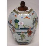 Faceted Chinese porcelain vase decorated in famille vert palette with Chinese figures, 35cm high