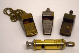 Small box containing quantity of four brass whistles