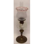 Brass oil lamp with glass reservoir and shade