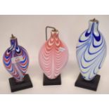 Three Nailsea type vases, all with coloured streaked designs, predominantly in blue and red, the