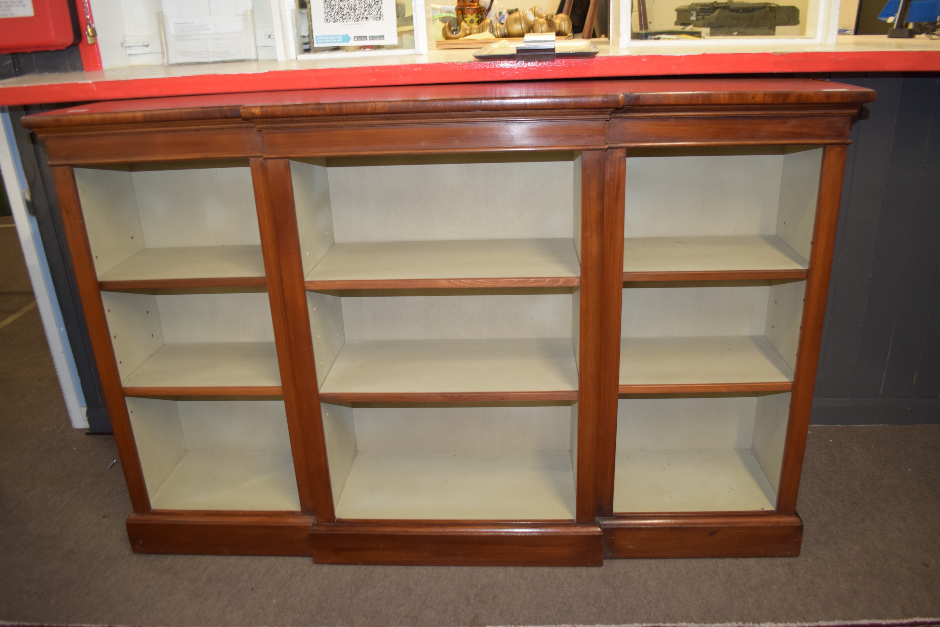 Good quality reproduction mahogany effect break front bookcase with strung and cross banded