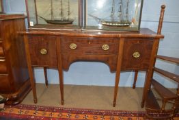 Early 20th century serpentine sideboard raised on tapered legs with strung decoration, length approx