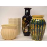 Group of four pottery vases of various shapes and designs