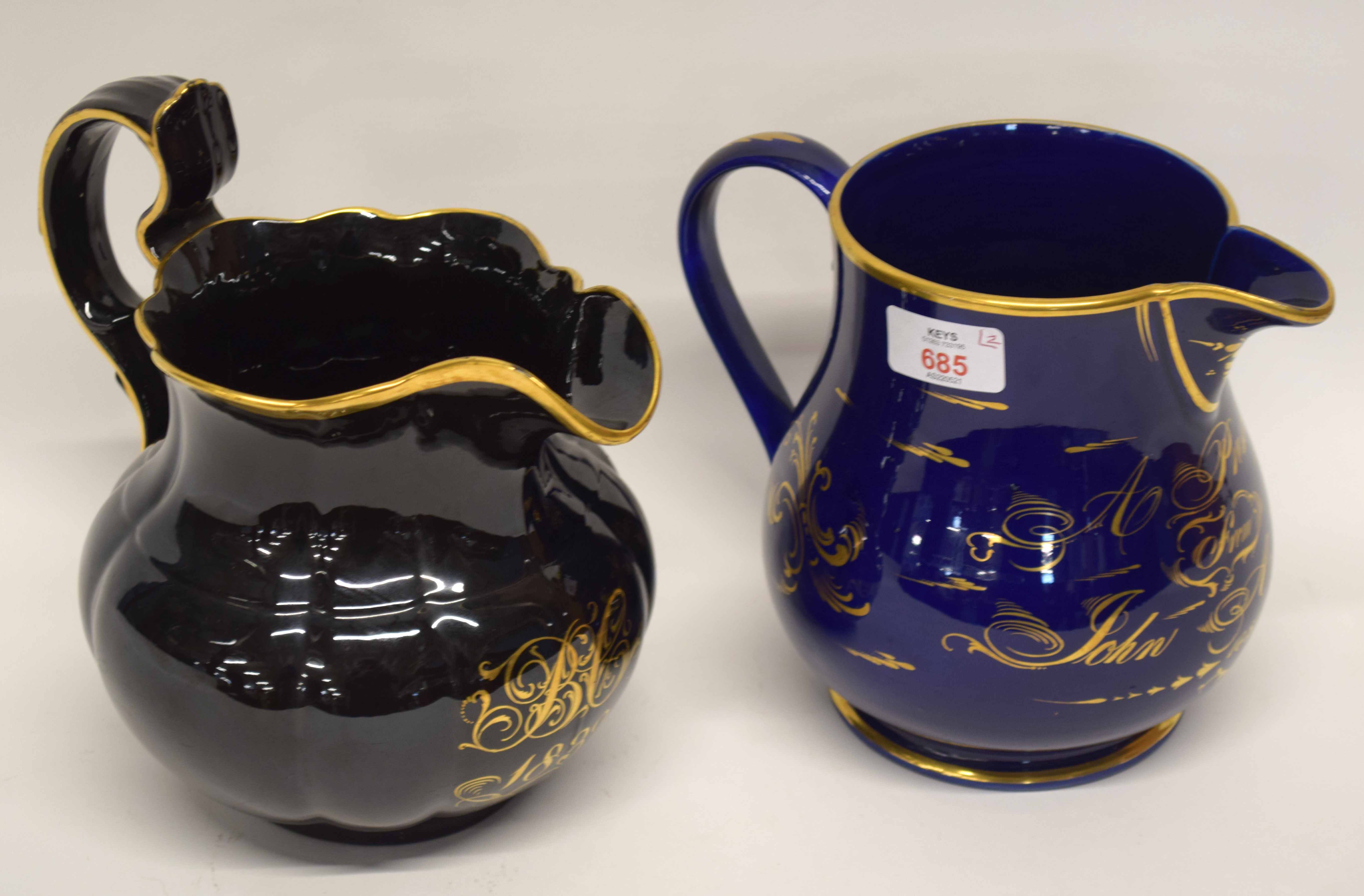 Two early to mid 19th century pottery jugs, one with blue ground and inscription in gilt dated 1859,