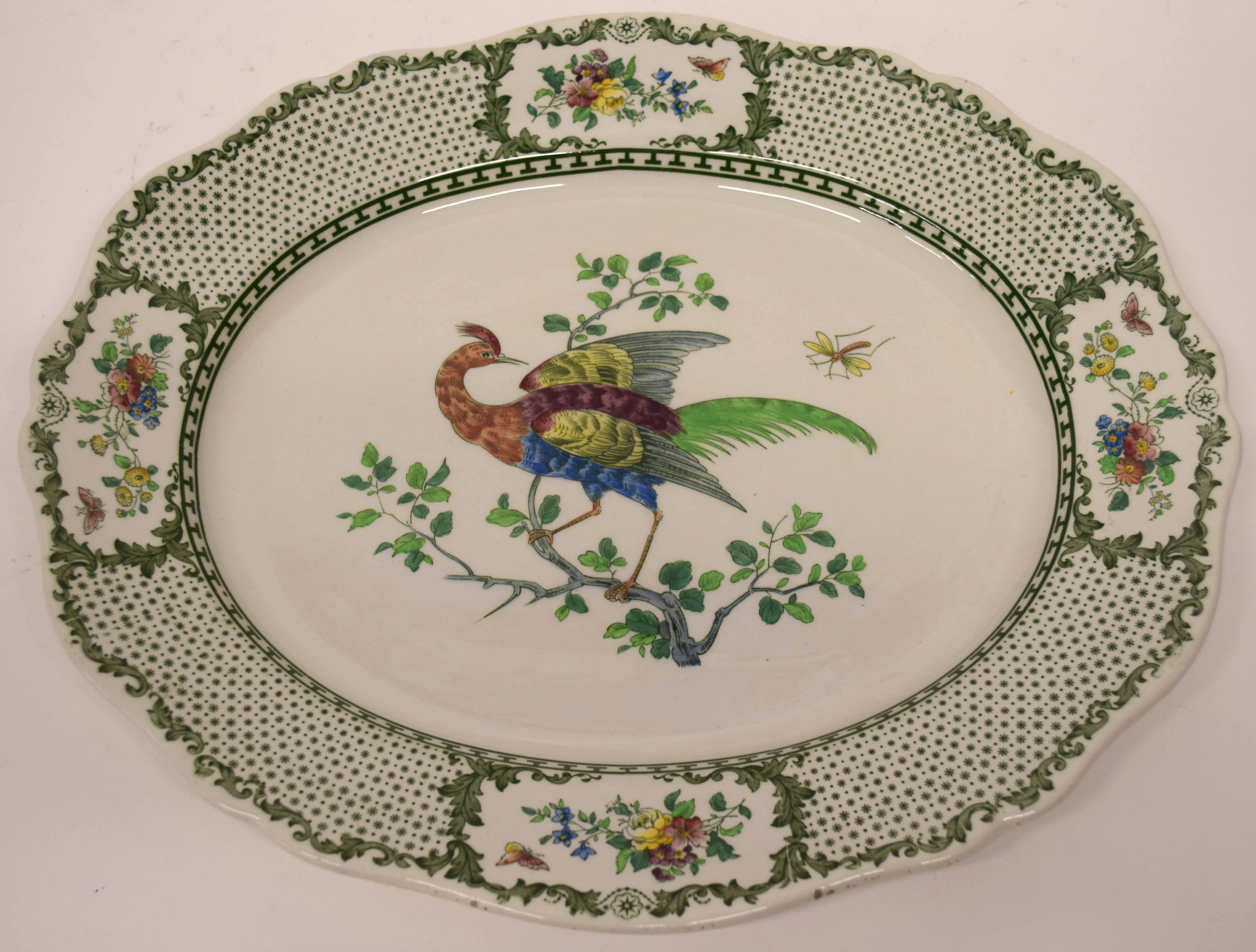 Large Cauldon serving dish decorated to the centre with a bird on a branch