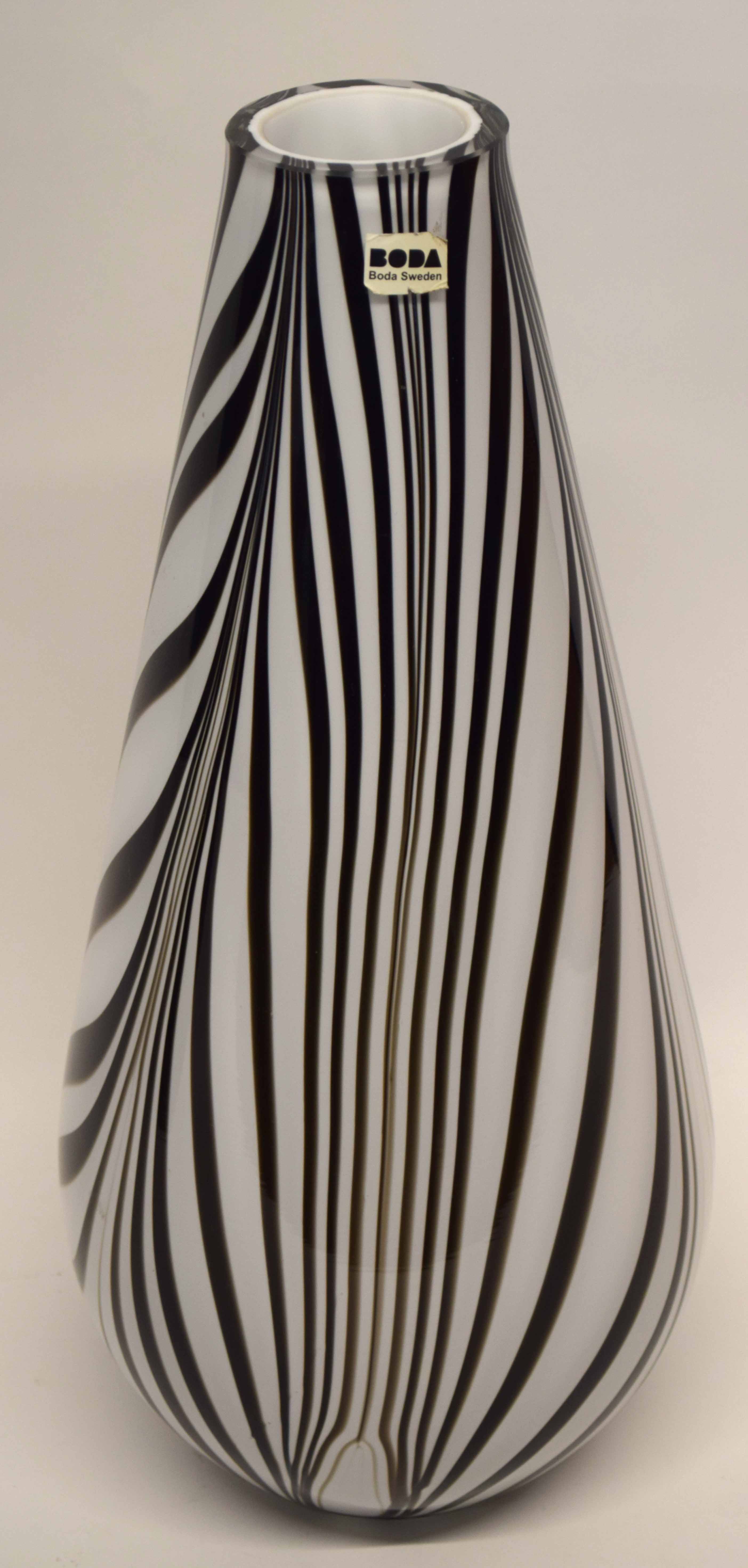 Boda glass vase, the tapered body with a streaked black design on white ground, 43cm high, Boda