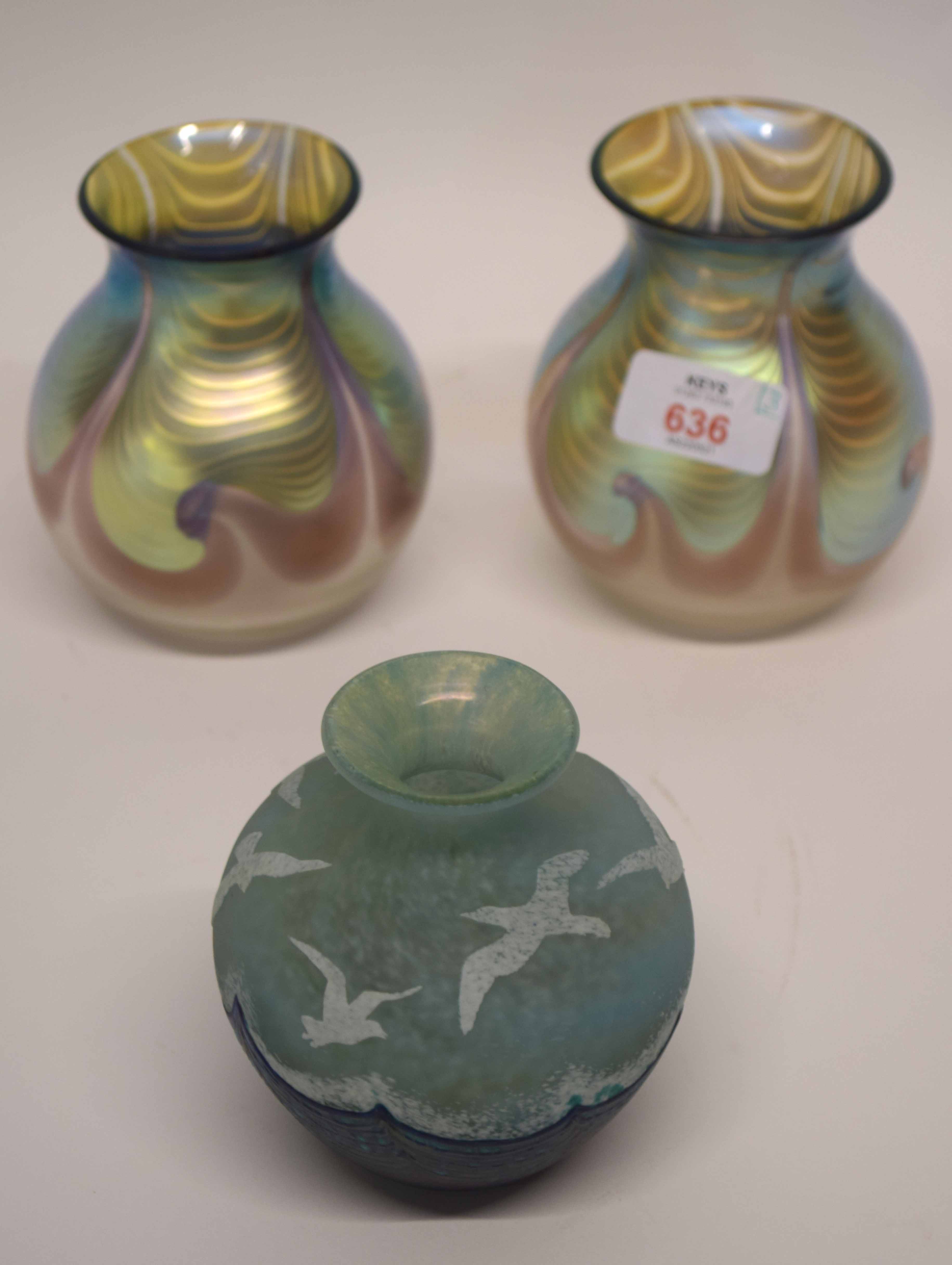 Pair of Loetz type vases with an iridescent design, together with a further Art Glass vase decorated