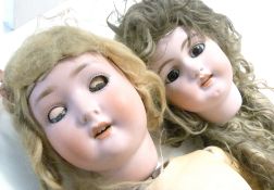 Pair of bisque headed dolls, one by Simon & Halbig, the other possibly Armand Marseille, both in a/f