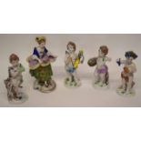 Group of five Continental porcelain figures, four of putti, allegorical of the Arts, and a further