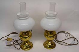 Brass oil lamp converted for electricity, plus two white shades