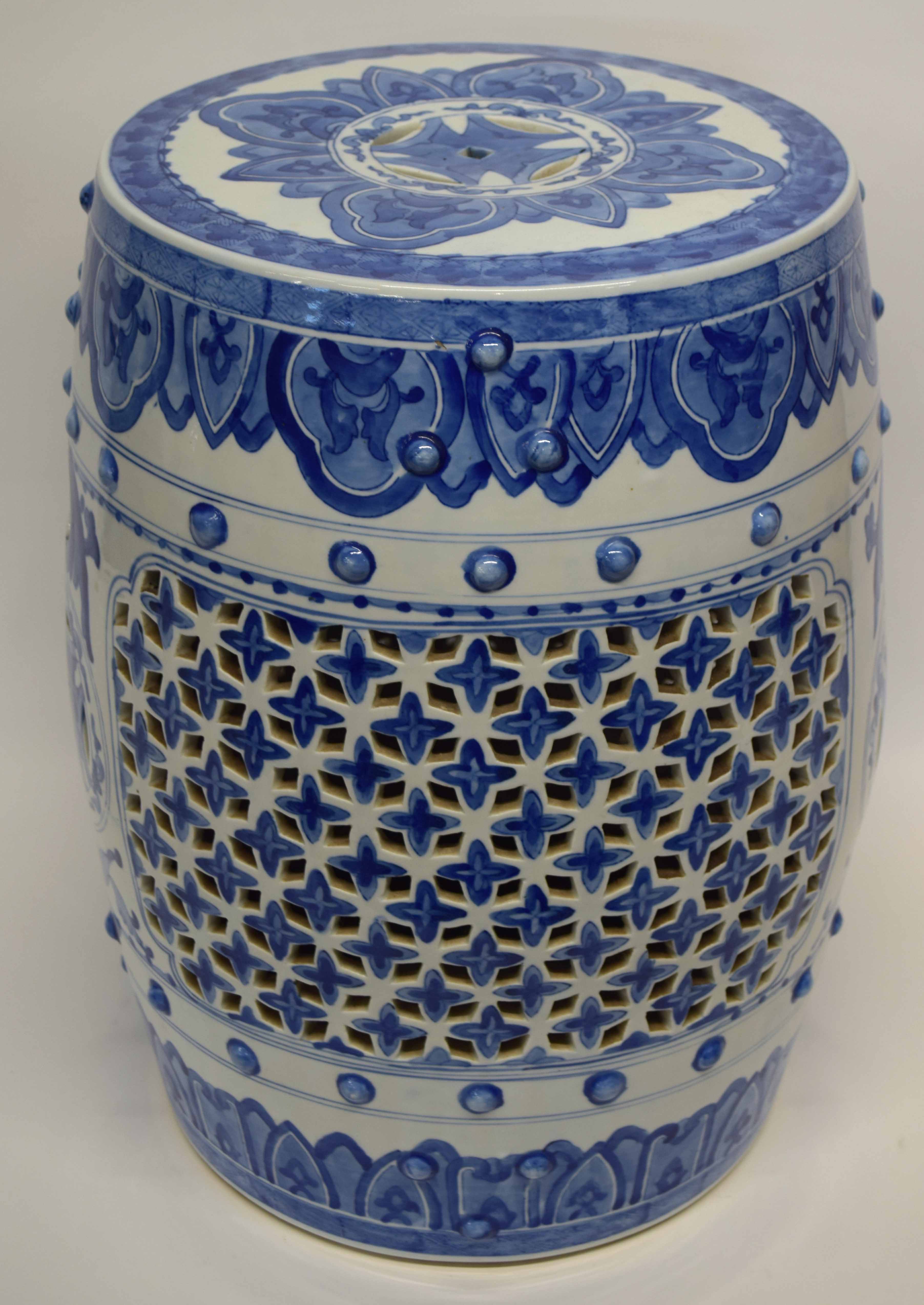 Chinese porcelain garden seat decorated in underglaze blue with reticulated sides, 48cm high